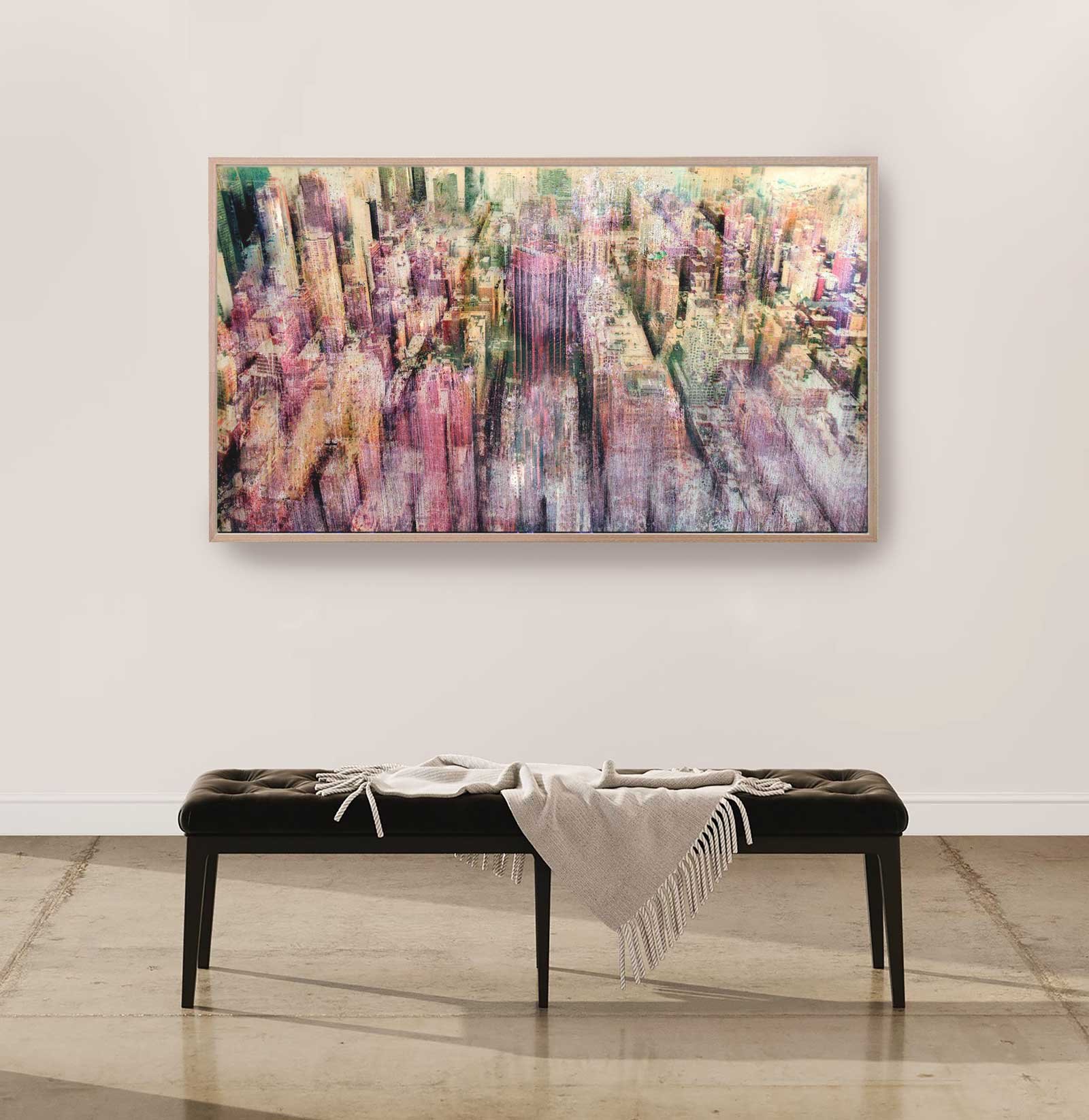 Urban skyline painting in purple tones by Dario Moschetta, displayed in a modern interior.