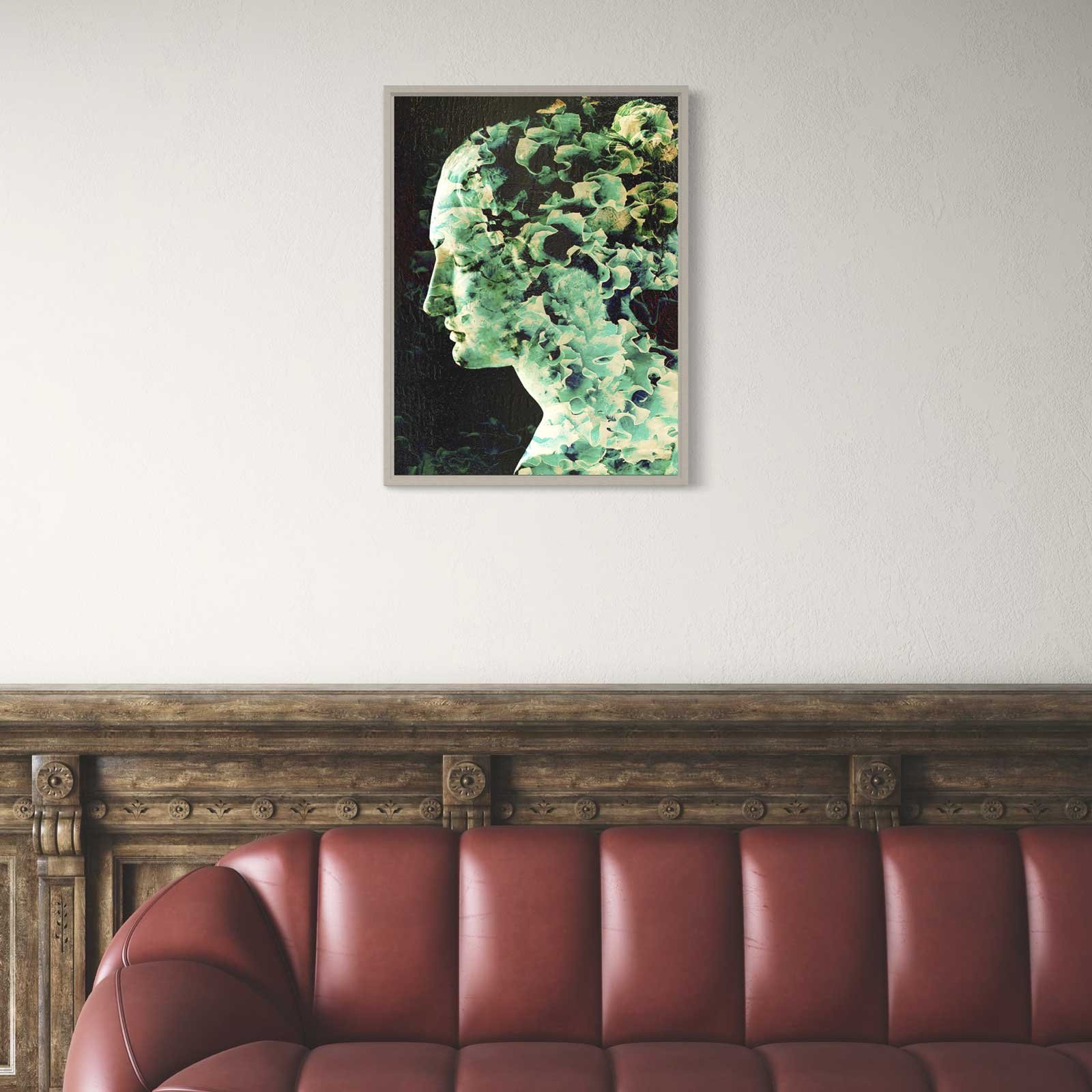 Female silhouette filled with green leaf patterns in profile view, mixed media work by Dario Moschetta