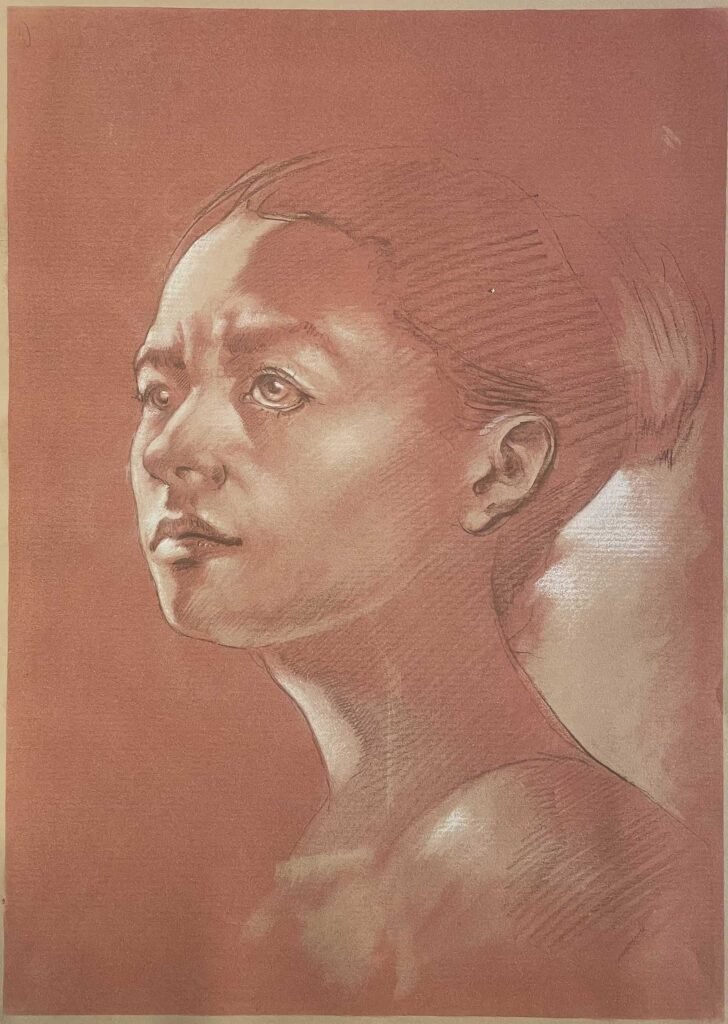 Female head portrait drawing in red chalk by Dario Moschetta – sanguine, pencil and pastel on paper | Ritratto femminile a matita e sanguigna su carta | Portrait féminin sur papier rouge | Retrato femenino académico | Weibliches Porträt auf rotem Papier