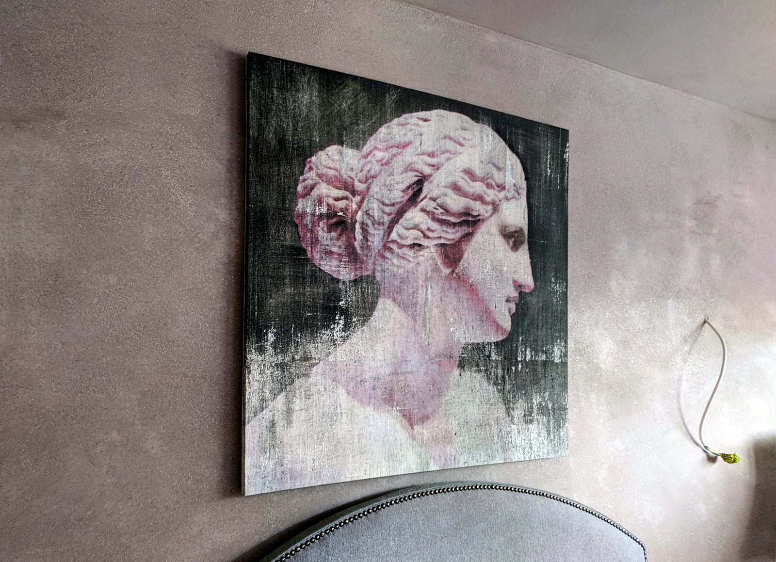 Pink bust painting by Dario Moschetta installed in bedroom interior