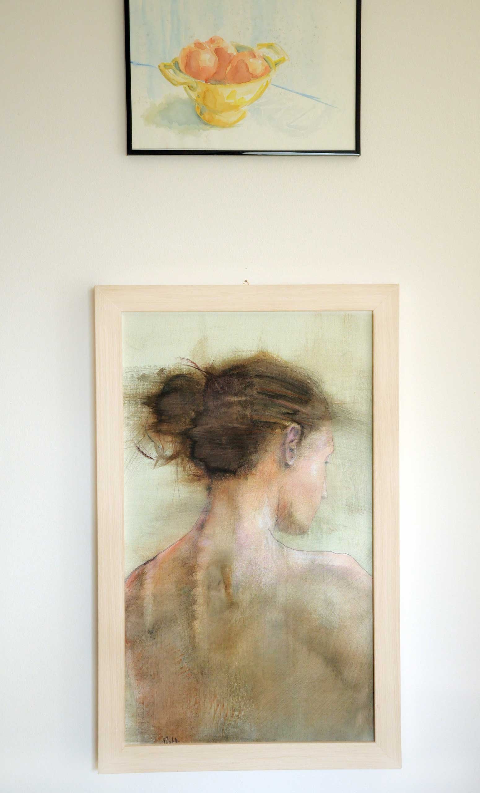 Female nude back portrait painting by Dario Moschetta installed on wall