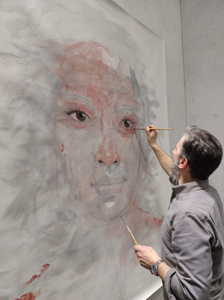Dario Moschetta painting the portrait live, MIDO 2024