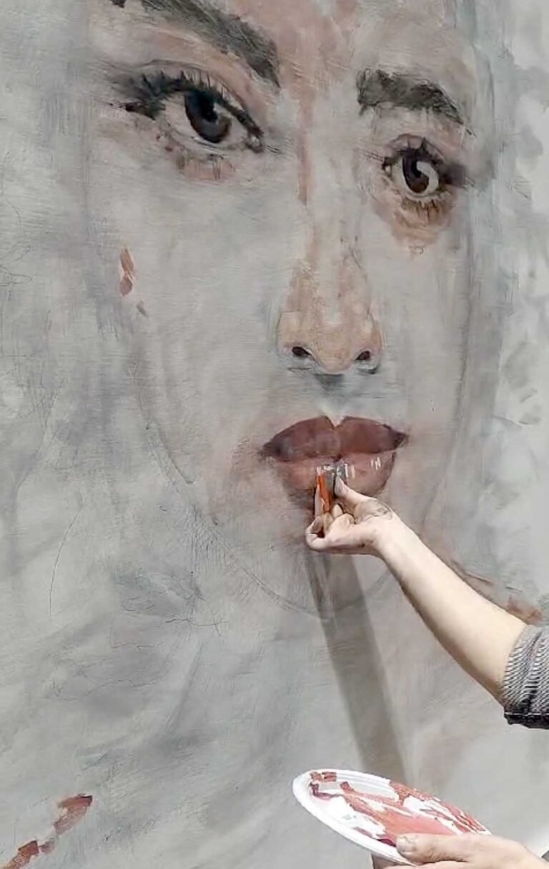 Close-up of the brush on the lips of the portrait, MIDO 2024