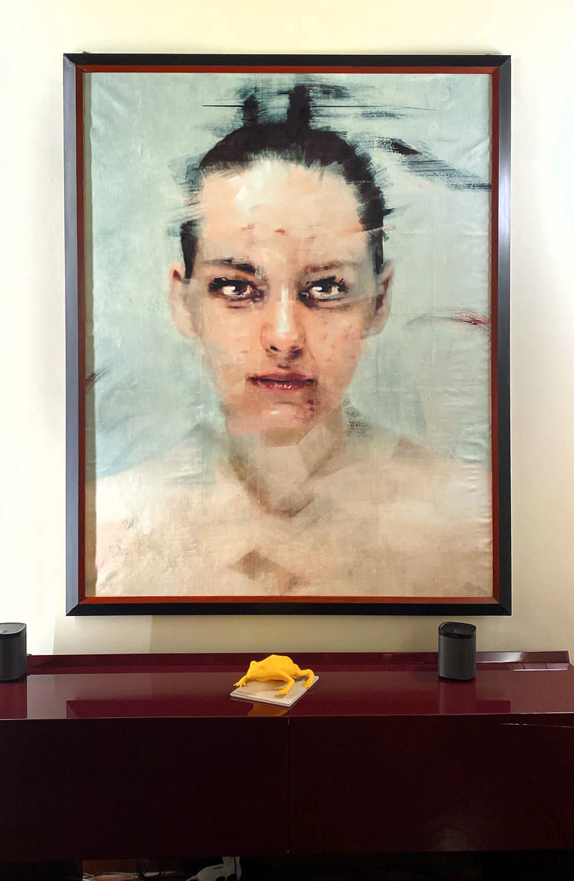 Large female portrait painting by Dario Moschetta installed in contemporary home