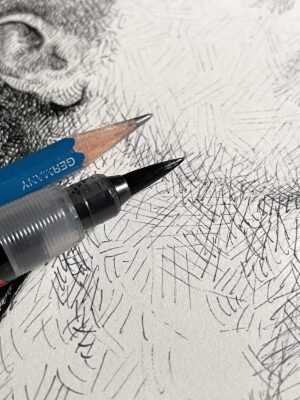 Brush and pencil working on “Profile in Lines” – contemporary ink portrait drawing