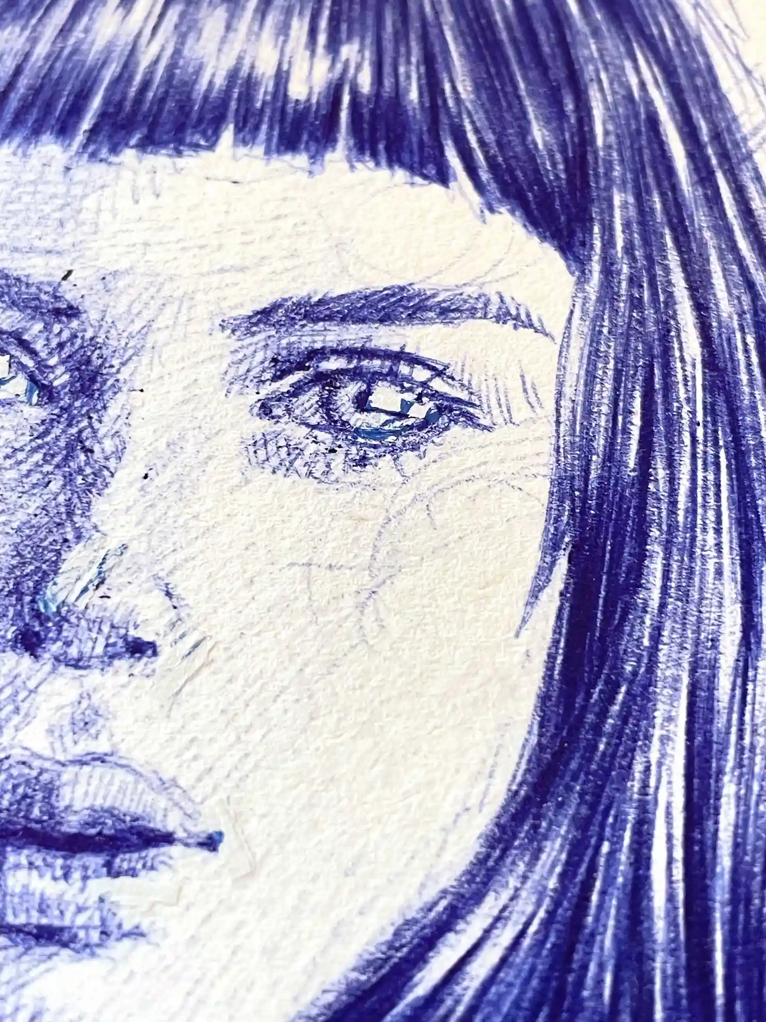 Close-up of female face and eyes from blue ballpoint portrait drawing for sale