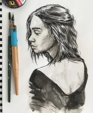 Ink and watercolor portrait drawing on artist’s desk with brushes — handmade artwork by Dario Moschetta