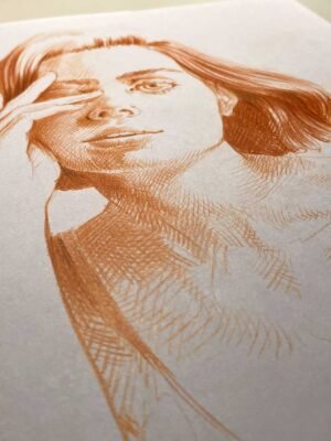 Angled view of red pastel portrait drawing “Red Quietness” showing expressive cross-hatching technique