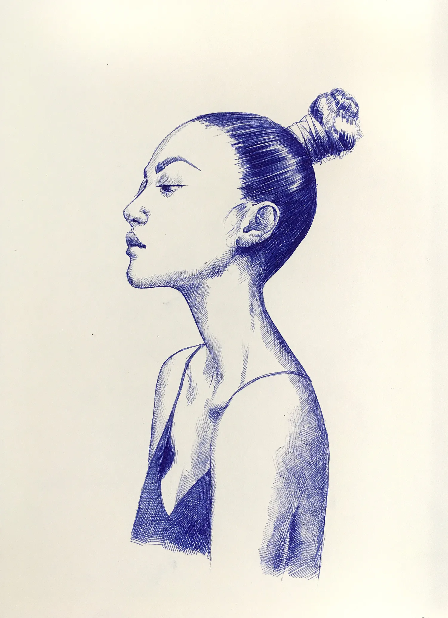 Full view of a female portrait in blue ballpoint ink on A4 paper, showcasing the entire composition with smooth shading
