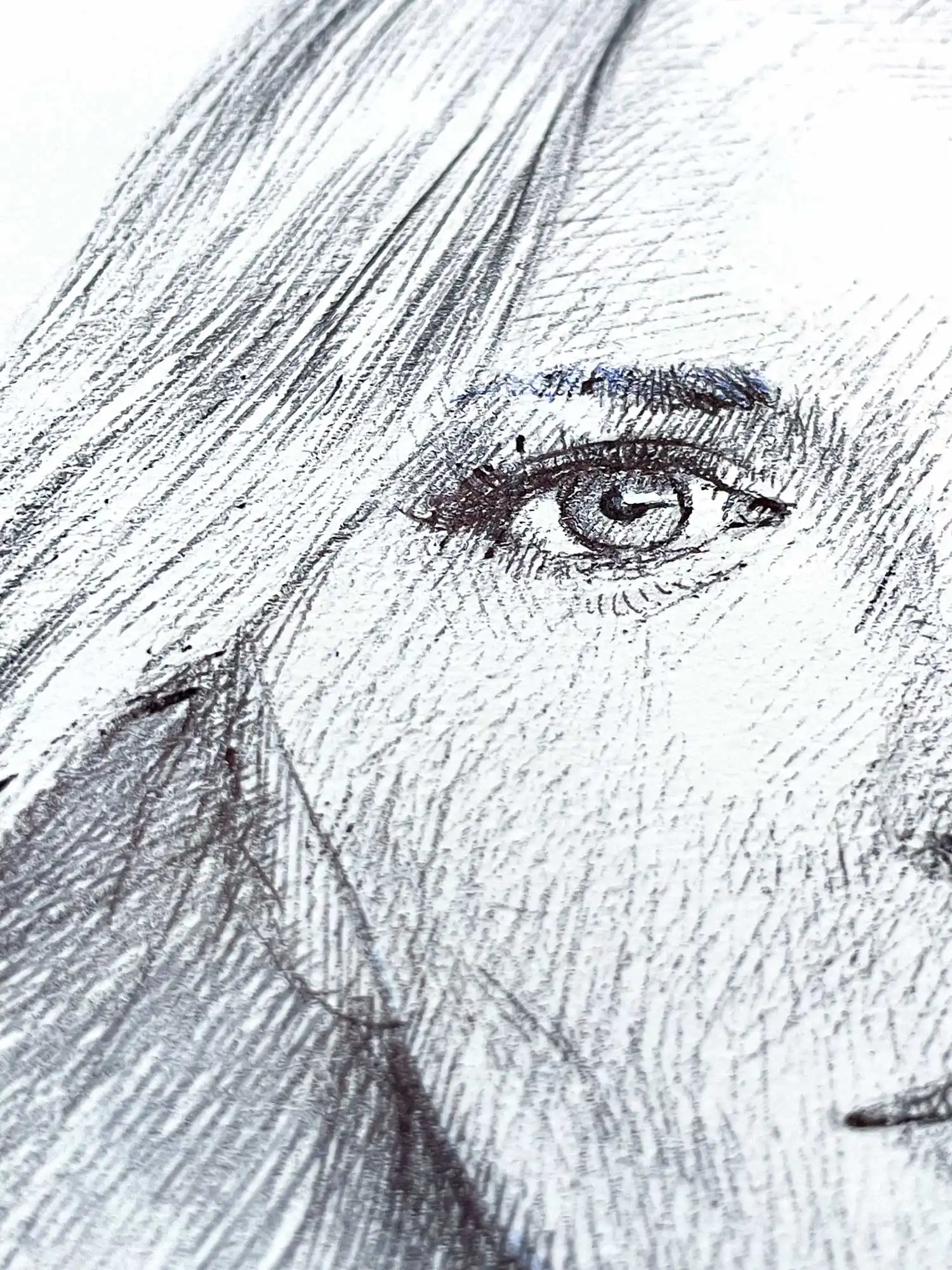 Eye detail of female ballpoint portrait drawing in black ink on paper by Dario Moschetta