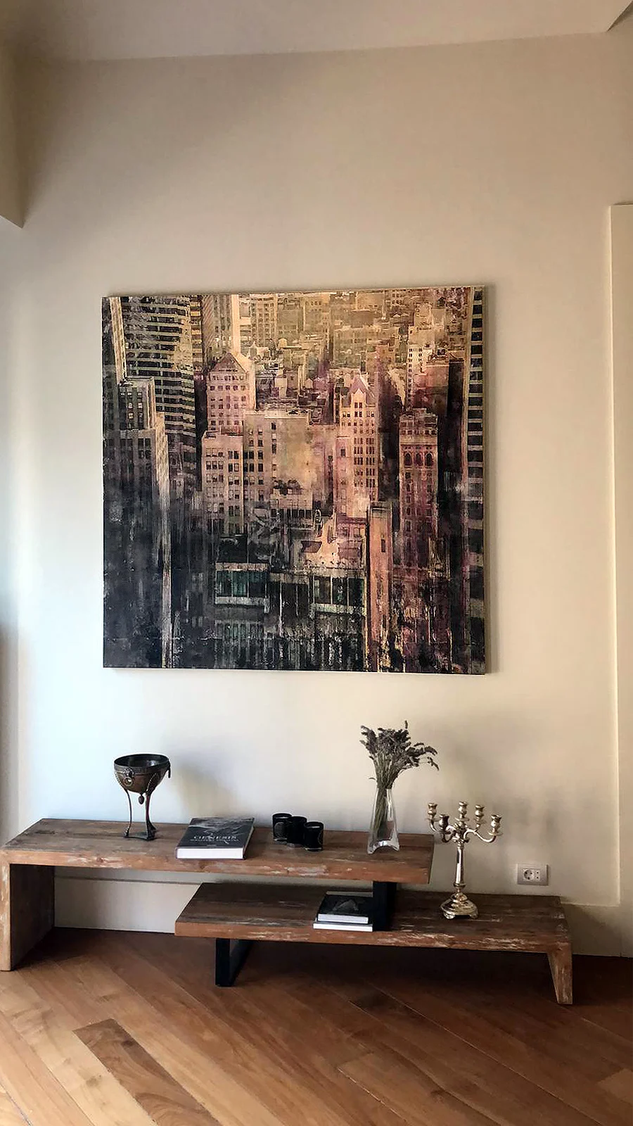 Visionary contemporary artist urban painting displayed in a luxury interior setting