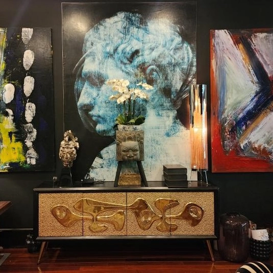 Contemporary artwork displayed in a private collection after acquisition through an art auction