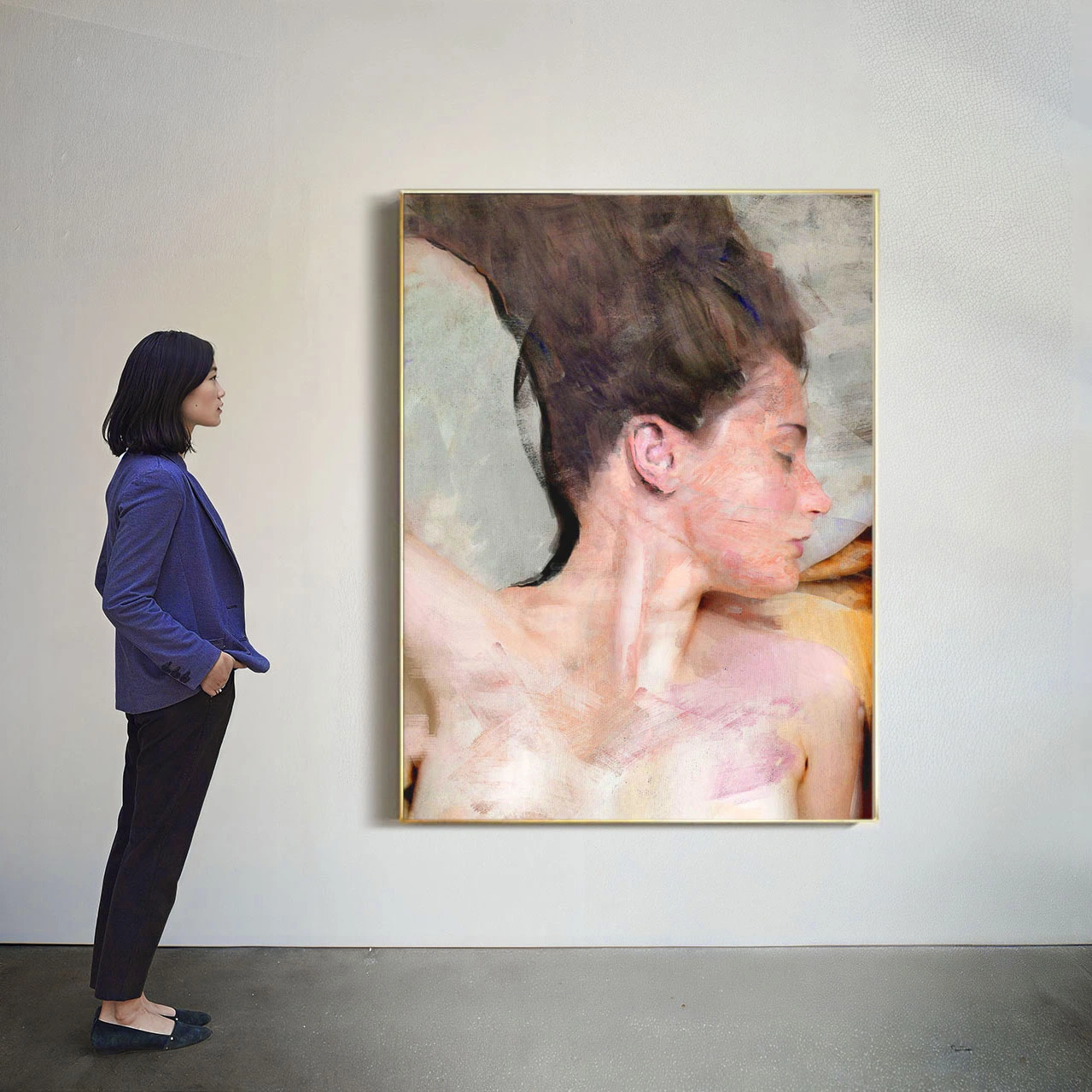 Visitor observing a contemporary portrait painting in an editorial journal section by Dario Moschetta