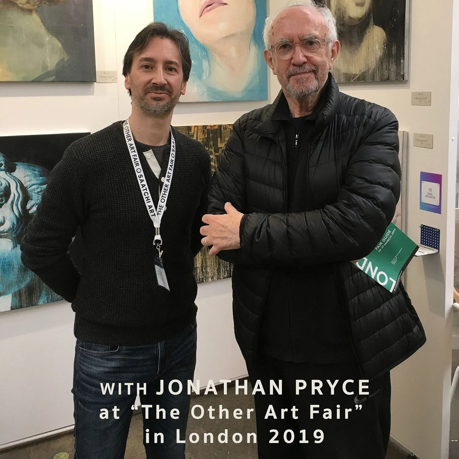 Italian contemporary artist Dario Moschetta with actor Jonathan Pryce at The Other Art Fair in London, 2019