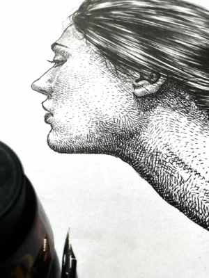 Female profile portrait ink drawing on paper with detailed shading and realistic features