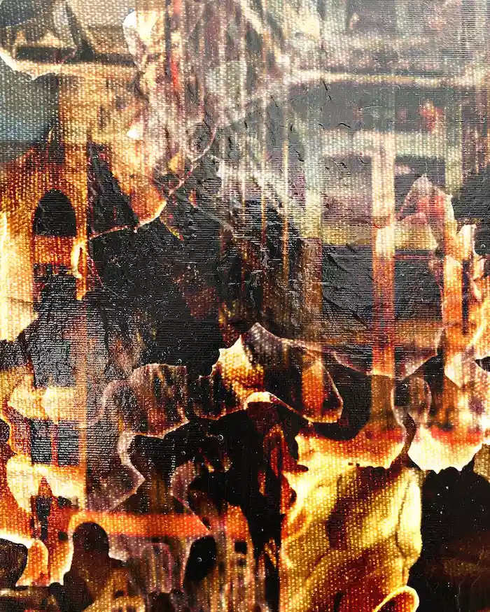 Detail of amber cityscape painting showing textured mixed media surface and warm tones