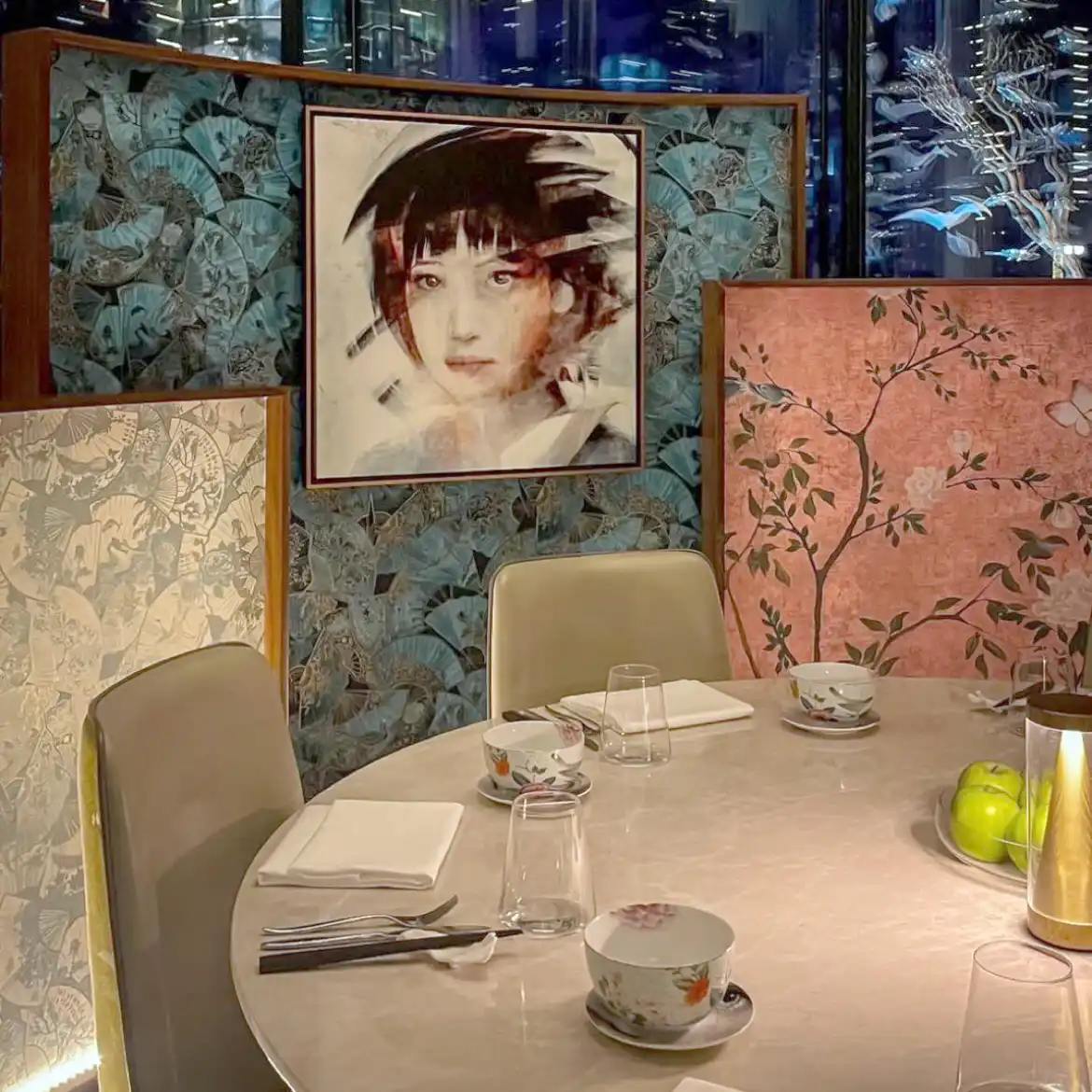 Art for hospitality — original portrait painting in Kai's Songbird restaurant interior, Doha