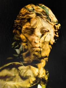 Contemporary classical portrait painting of a sculptural head in gold and black, mixed media on canvas by Dario Moschetta