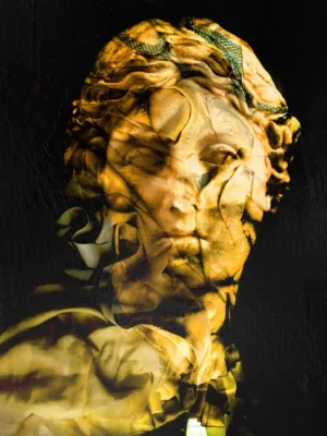 Contemporary classical portrait painting of a sculptural head in gold and black, mixed media on canvas by Dario Moschetta